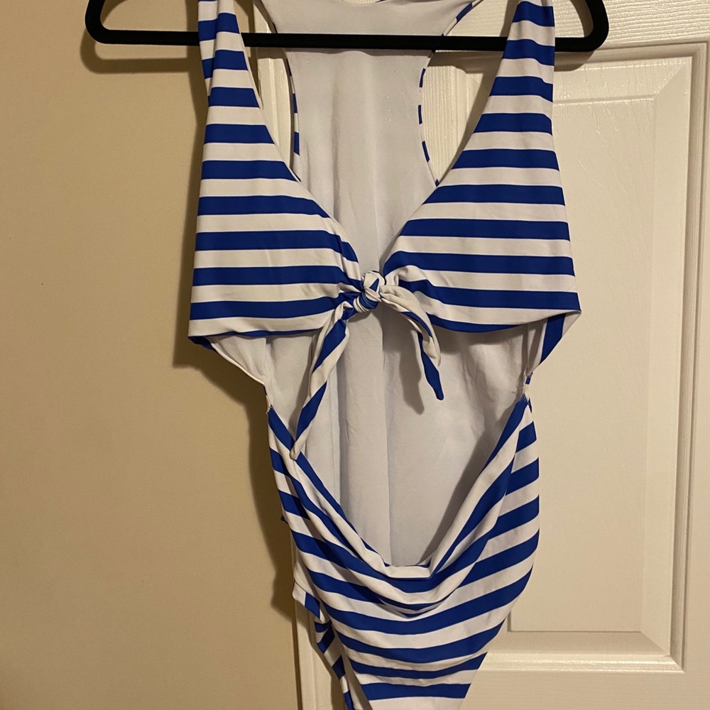 Blue and white striped bathing suit